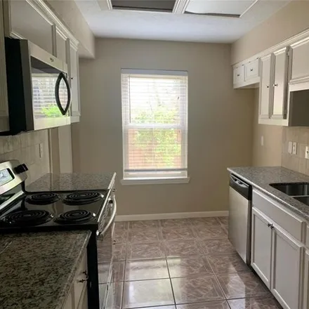 Rent this 4 bed house on 4119 Park Douglas Drive in Harris County, TX 77084