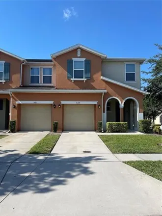 Rent this 4 bed house on 3129 Tocoa Cir in Kissimmee, Florida