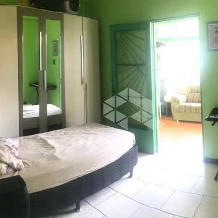 Buy this 4 bed house on Rua Osvaldo Ortiz in Estância Velha, Canoas - RS