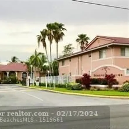 Rent this 2 bed condo on 3226 Sabal Palm Manor in Davie, FL 33024