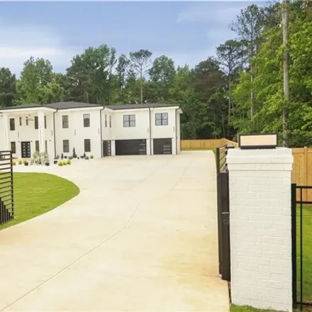 Buy this 5 bed house on 352 Simonton Road Southeast in Lawrenceville, GA 30045