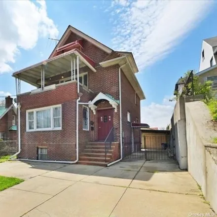 Buy this 4 bed house on 85-94 150th Street in New York, NY 11435