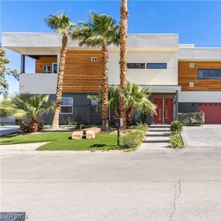 Buy this 7 bed house on 3405 W Robindale Rd in Las Vegas, Nevada