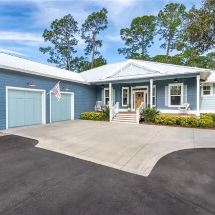 Buy this 3 bed house on 2676 Old Smyrna Trail in New Smyrna Beach, FL 32168