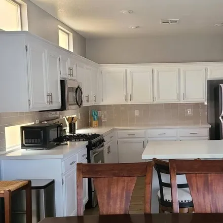 Rent this 3 bed house on Novato Way in Las Vegas, NV