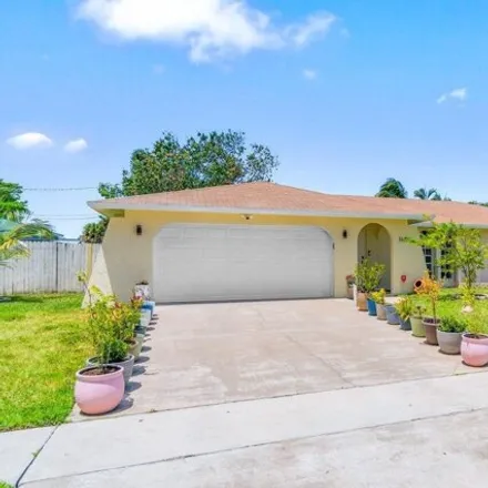 Buy this 4 bed house on 1751 Northwest 8th Street in Paradise Palms, Boca Raton
