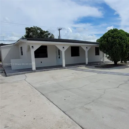 Buy this 4 bed house on 3515 Northwest 96th Street in Miami-Dade County, FL 33147