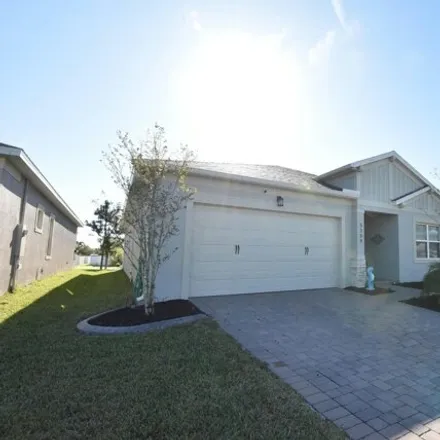 Buy this 4 bed house on 5309 Cade Fernery Road in Port Orange, FL 32127