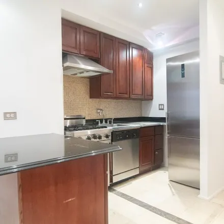 Rent this 2 bed apartment on 123 West 58th Street in New York, NY 10019