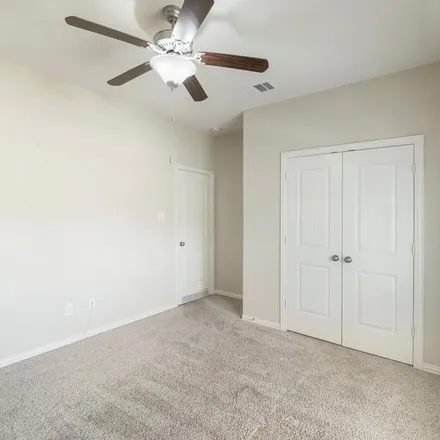 Rent this 4 bed apartment on Cibolo Creek in Harris County, TX 77433