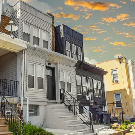 Buy this 3 bed townhouse on 5211 Warrington Avenue in Philadelphia, PA 19143