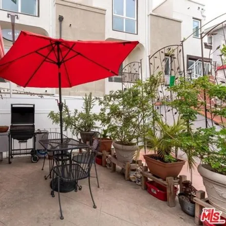 Rent this 4 bed house on 1242 Lodi Place in Los Angeles, CA 90038