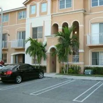 Rent this 2 bed apartment on 7100 Northwest 177th Street