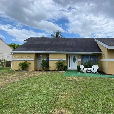 Buy this 5 bed house on 8916 Crescent Drive in Miramar, FL 33025