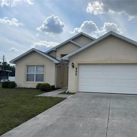 Rent this 3 bed house on 556 Rose Apple Circle in Charlotte County, FL 33954