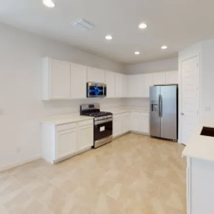 Rent this 4 bed apartment on 12617 West Morten Avenue in Yucca, Glendale
