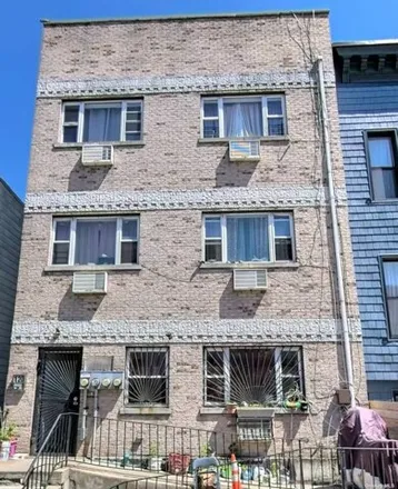 Rent this 4 bed apartment on 120 Cooper Street in New York, NY 11207