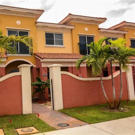 Rent this 2 bed townhouse on Northwest 30th Street in Golf Estates, Lauderdale Lakes