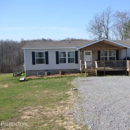 Buy this studio apartment on 1033 Flynns Cove Rd in Crossville, Tennessee