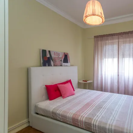 Rent this 4 bed room on Rua da Guiné 2 in 1170-173 Lisbon, Portugal