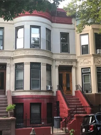 Buy this 5 bed townhouse on 923 Lincoln Place in New York, NY 11213