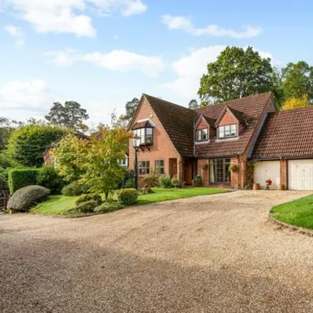 Buy this 4 bed house on Honeysuckle Lane in Beech Hill, Headley Down