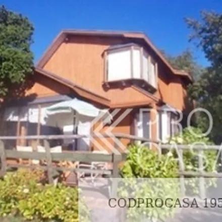 Rent this 4 bed house on Costanera Roberto Geiss in 492 0561 Pucón, Chile