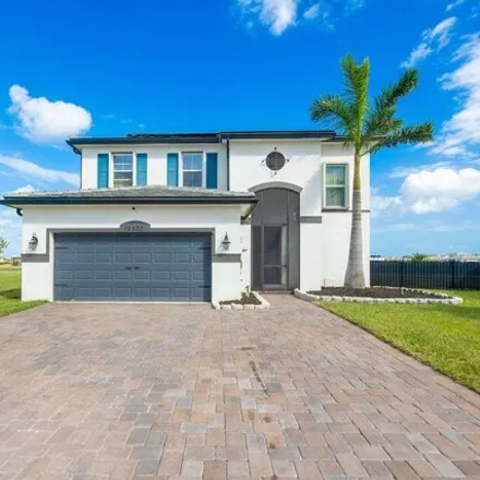 Buy this 4 bed house on 12565 Southwest Milestone Place in Port Saint Lucie, FL 34987