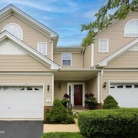 Buy this 2 bed townhouse on 24 Village Drive in Eatontown, NJ 07724
