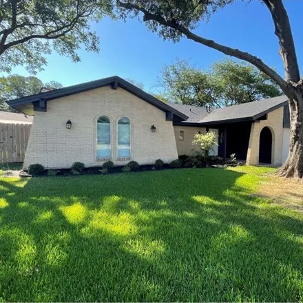 Rent this 3 bed house on 2565 Westchester Drive in Arlington, TX 76015