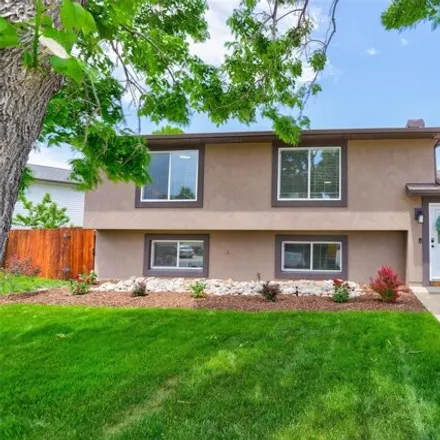 Buy this 4 bed house on 8771 West Stetson Place in Denver, CO 80123
