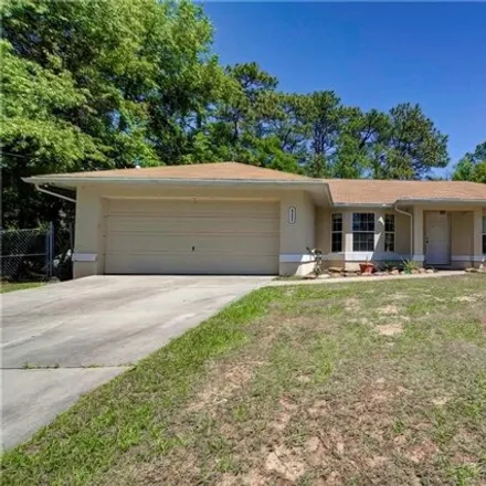 Buy this 4 bed house on 9227 North Tahiti Way in Citrus Springs, FL 34433