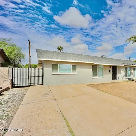 Rent this 4 bed house on 3108 North 39th Avenue in Phoenix, AZ 85019