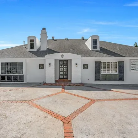 Rent this 4 bed house on 949 North Norman Place in Los Angeles, CA 90049