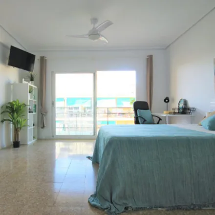 Rent this 4 bed room on Carrer de Campoamor in 46021 Valencia, Spain