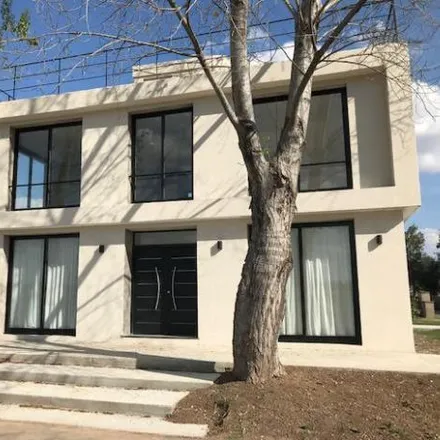 Rent this 4 bed house on Bulevar Wilde in Fisherton, Rosario