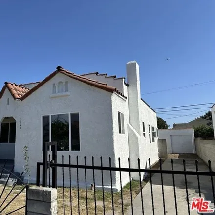 Buy this 3 bed house on 1128 W 65th Pl in Los Angeles, California