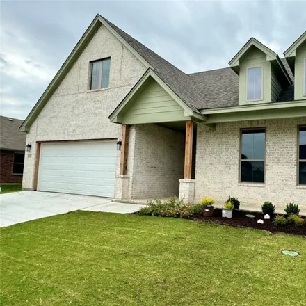 Rent this 4 bed house on 699 Mooney Drive in Saginaw, TX 76179