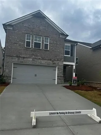Rent this 4 bed house on 1396 Park Avenue in Loganville, GA 30052