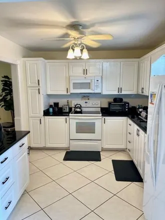 Rent this 1 bed condo on Oxford 400 in Century Village, Palm Beach County