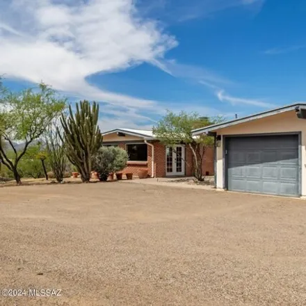 Buy this 3 bed house on 1482 West Calle Tiburon in Casas Adobes, AZ 85704