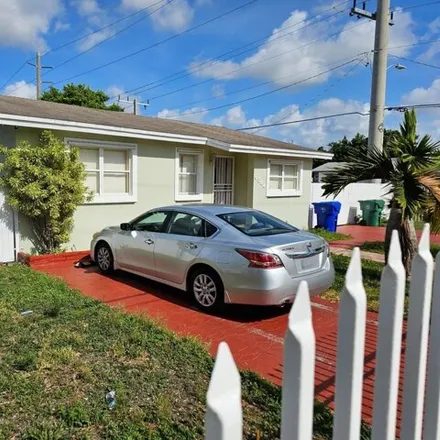 Buy this 4 bed house on 6544 NW 6th Ave in Miami, Florida