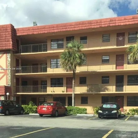 Rent this 2 bed apartment on West 69th Street in Palm Springs Estates, Hialeah
