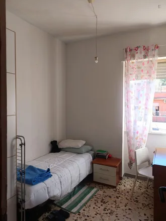 Rent this 3 bed room on Via Torrita di Siena in 00148 Rome RM, Italy