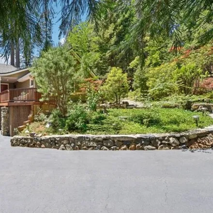 Buy this 4 bed house on 13993 Seven Cedars Dr in Grass Valley, California