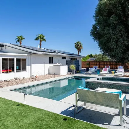 Rent this 4 bed apartment on 3079 East Via Escuela in Palm Springs, CA 92262