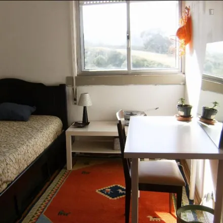 Rent this 3 bed room on Rua José Afonso 1 in 2660-278 Santo António dos Cavaleiros, Portugal