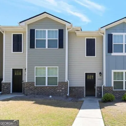 Buy this 4 bed house on Keeshund Street in Fulton County, GA 30291