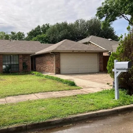 Rent this 3 bed house on 2406 Sutton Drive in Arlington, TX 76018