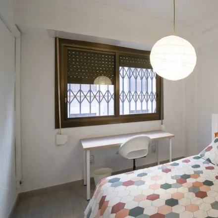 Rent this 4 bed room on Carrer del Torn de l'Hospital in 46001 Valencia, Spain